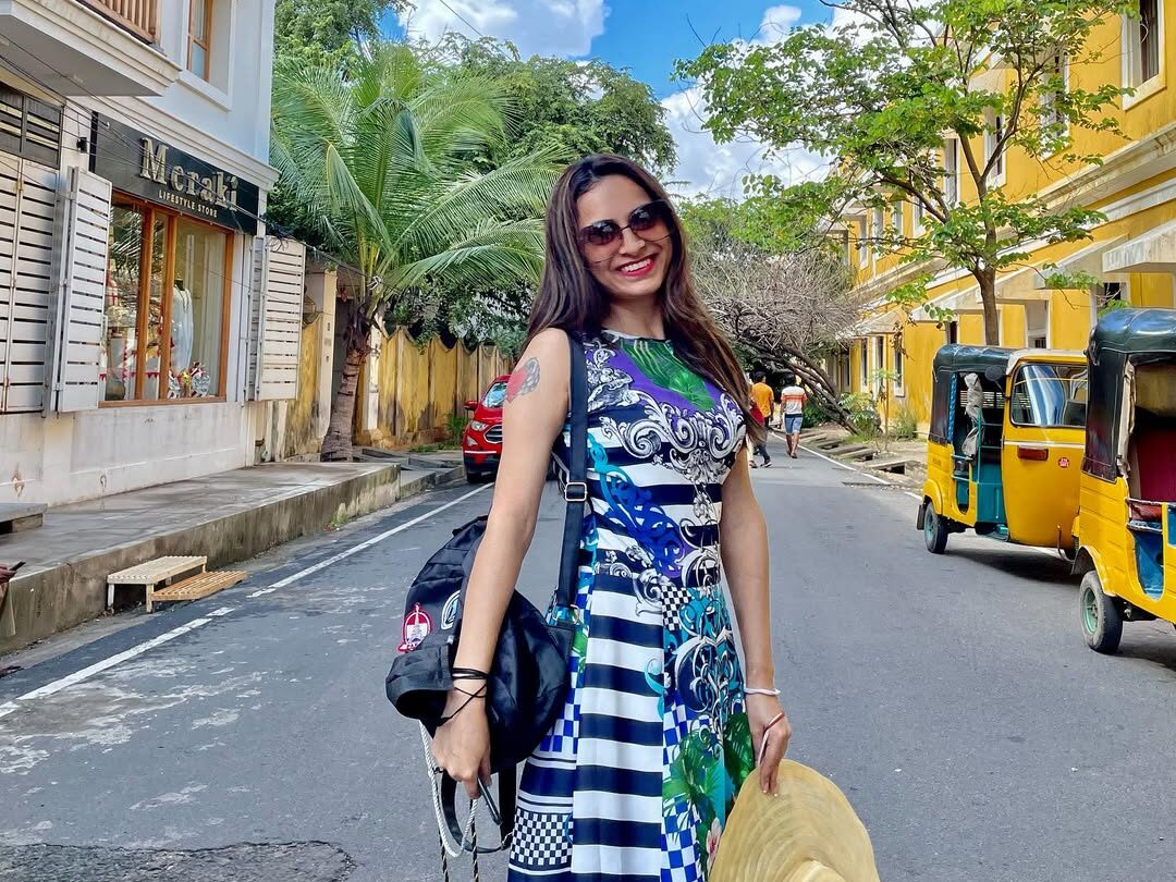 Solo woman traveler enjoying a walking tour in Pondicherry