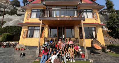 A group of all women travellers smiling at our Kotgarh weekend getaway