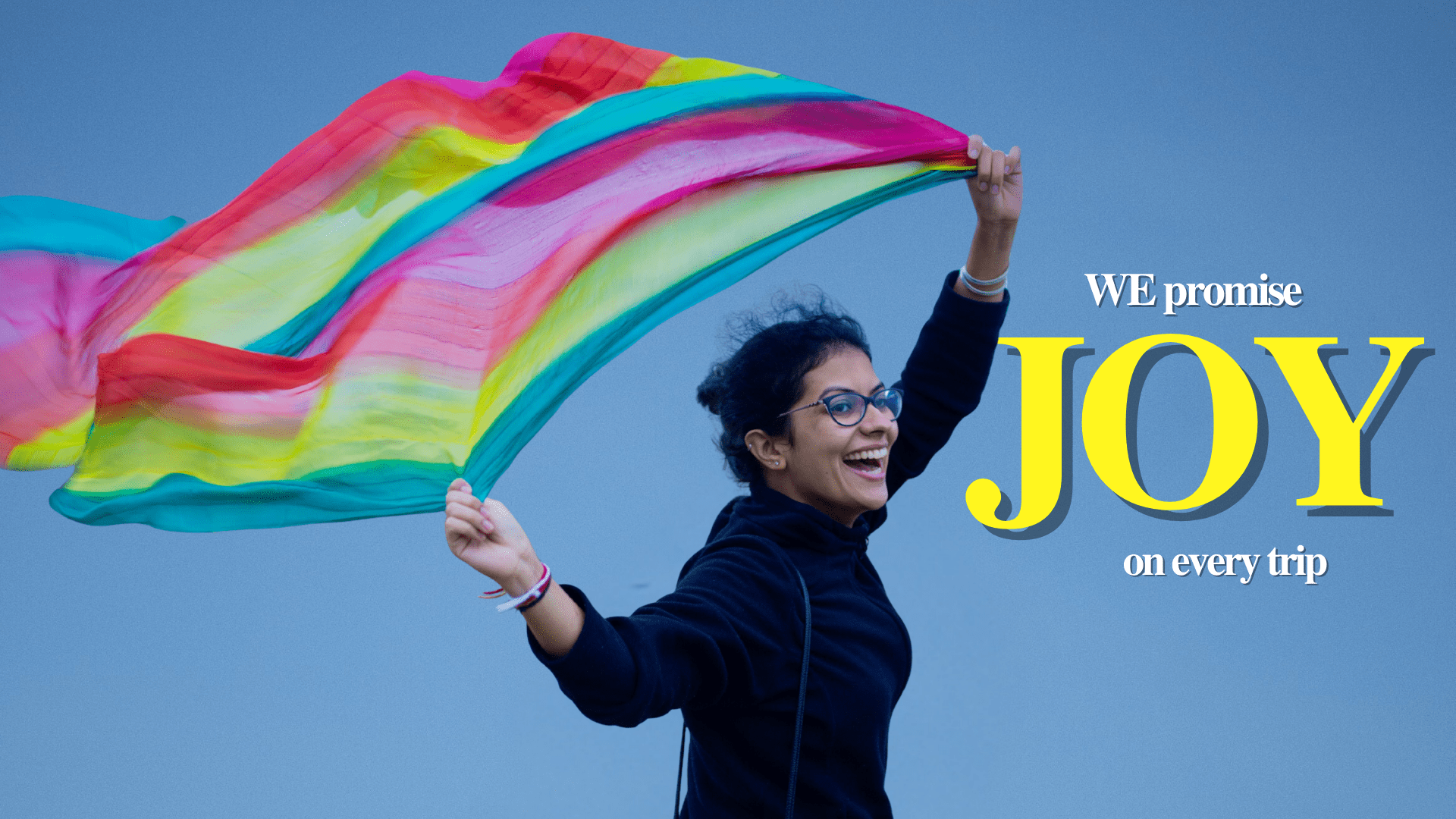 Joyful woman waving scarf – Jugni women-only travel group promise