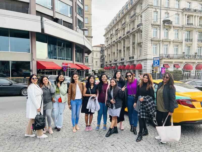 First solo all girls group trip to Turkey — Jugni women travellers posing outside their Istanbul hotel