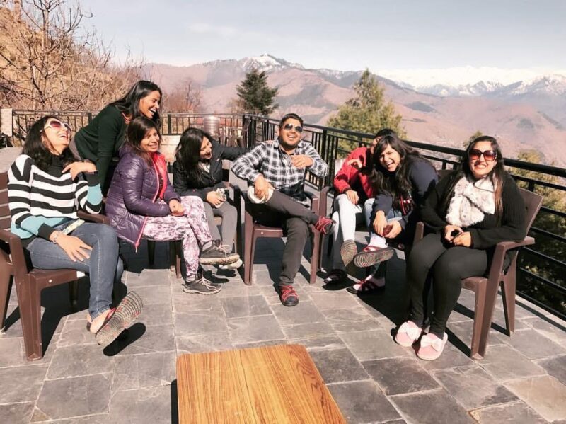 Jugni Travel group laughing together in the mountains during a women-only trip