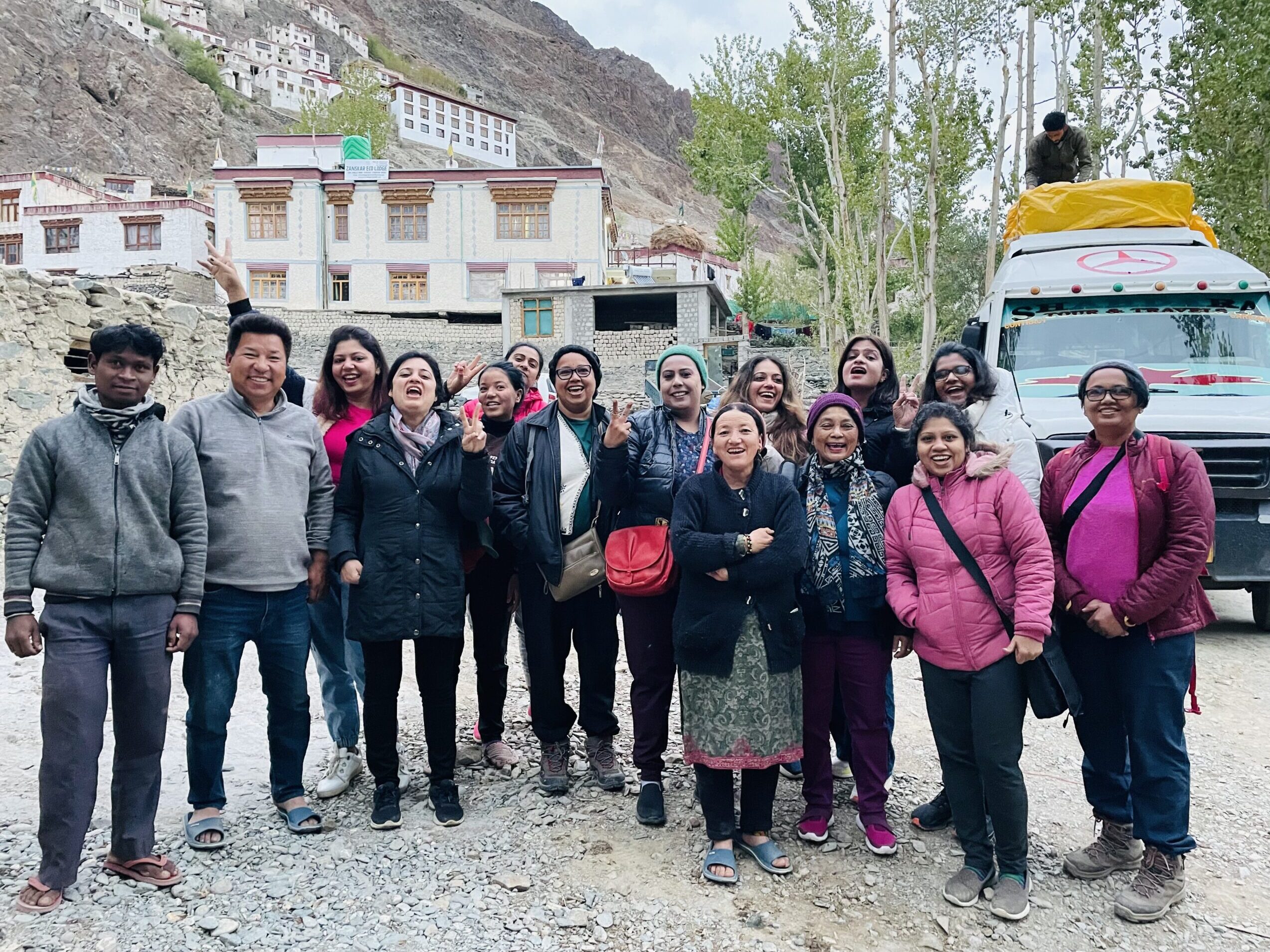 Group of solo women travellers on a Jugni women-only travel tour in India, smiling and bonding together.