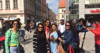 Europe group tour for solo women exploring the streets of Prague